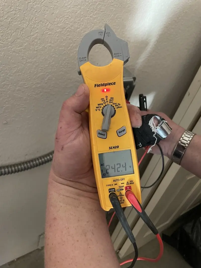 Voltage testing with clamp meter during Hot Tub / Pool Electrical Wiring in Holiday Shores